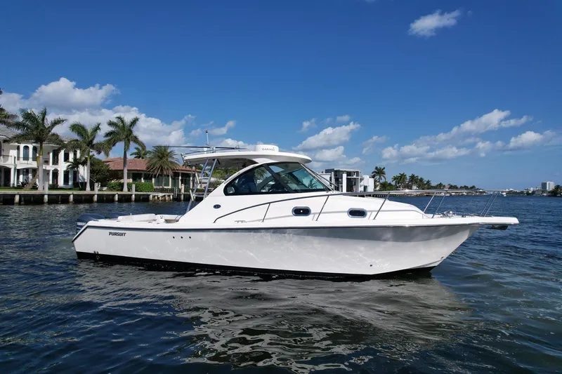 The Image of 2008 Pursuit 315 Offshore boat on calm water, with palm trees and houses in the background. - 0