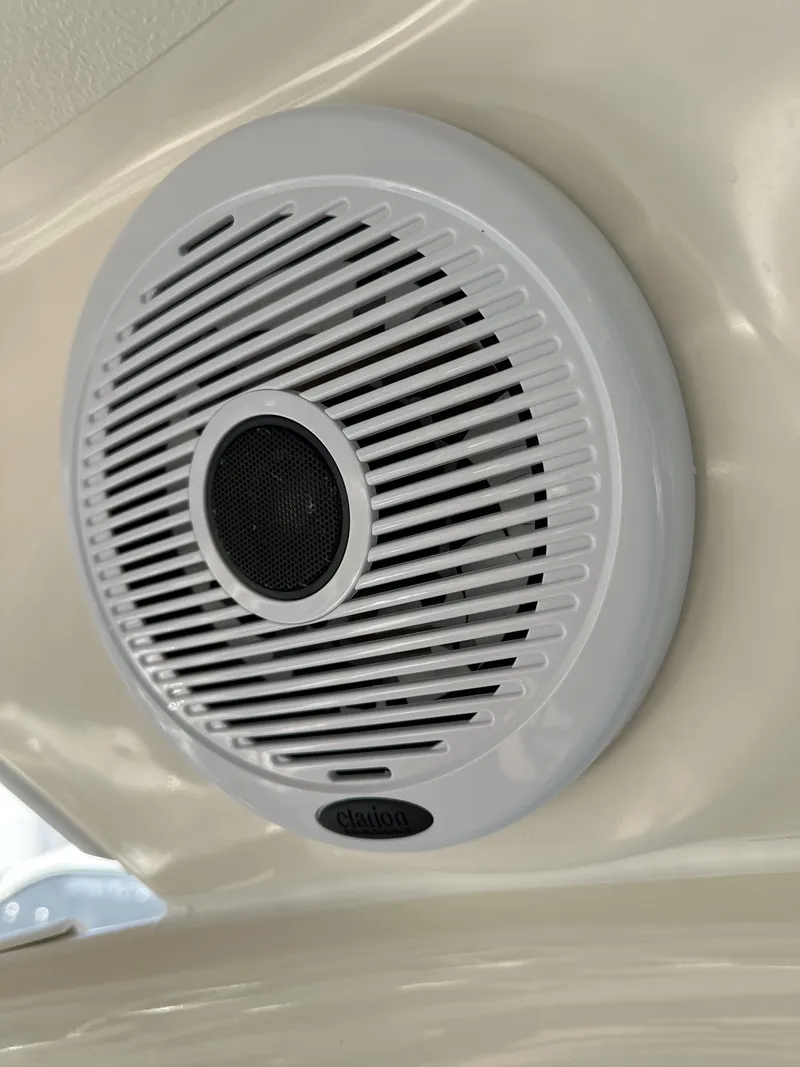 Slide: The Image of Close-up of a white speaker on a 2008 Pursuit 315 Offshore boat. - 23