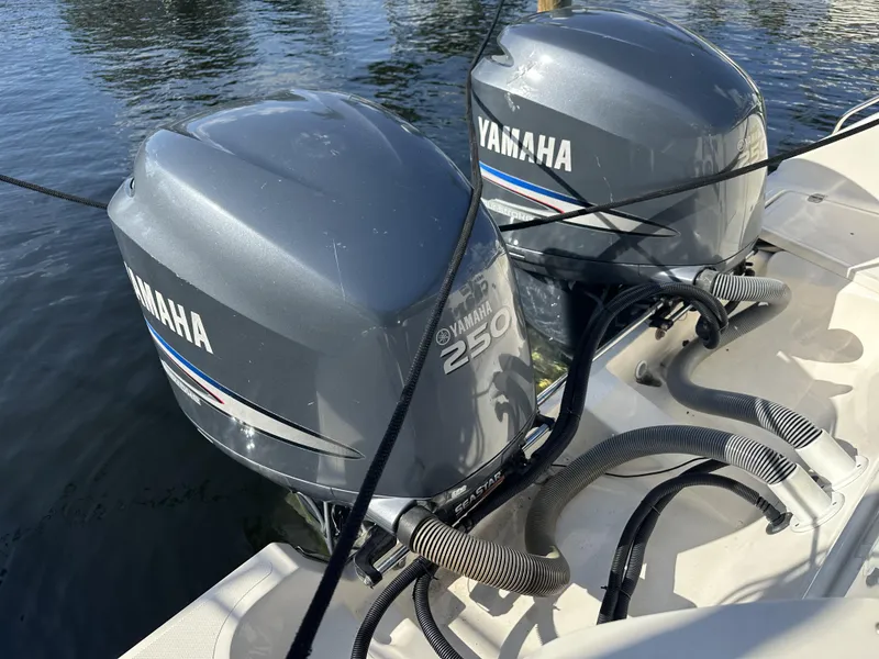 Slide: The Image of Twin Yamaha 250 outboard engines on a 2008 Pursuit 315 Offshore boat. - 37