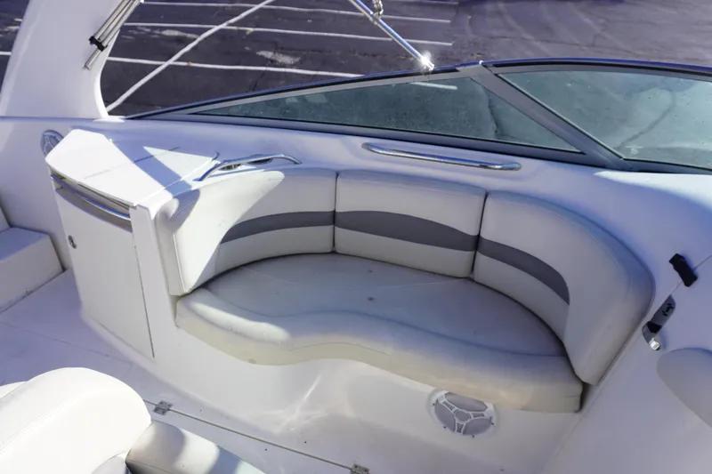 Slide: The Image of 2006 Chaparral 280SSi boat interior with curved seating and windshield. - 13