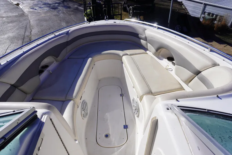 Slide: The Image of 2006 Chaparral 280SSi boat interior with spacious seating and storage compartments. - 14