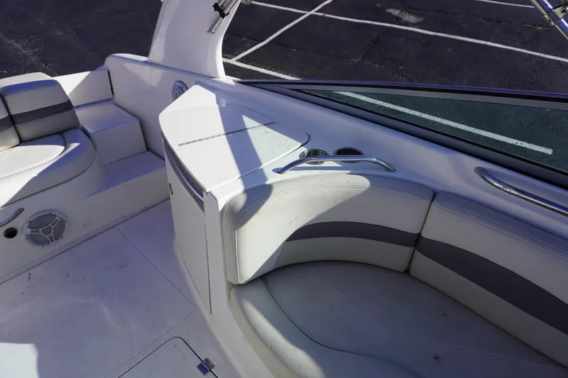 Slide: The Image of 2006 Chaparral 280SSi boat interior with white and gray seating. - 17