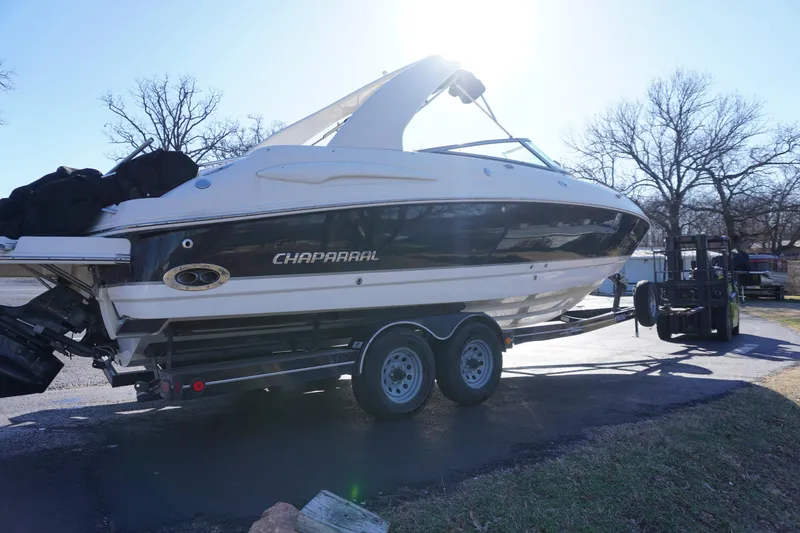 Slide: The Image of 2006 Chaparral 280SSi boat on trailer, parked outdoors in sunlight. - 3