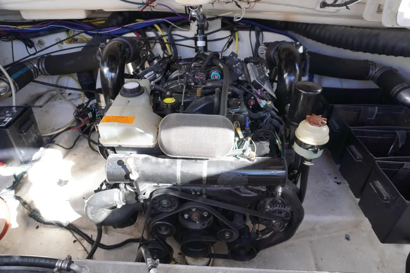Slide: The Image of Engine compartment of a 2006 Chaparral 280SSi boat, showcasing mechanical components. - 4