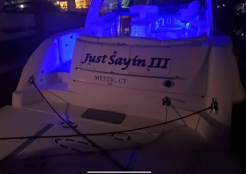 Slide: The Image of 2004 Sea Ray 500 Sundancer yacht, "Just Sayin III," docked at night in Mystic, CT. - 5