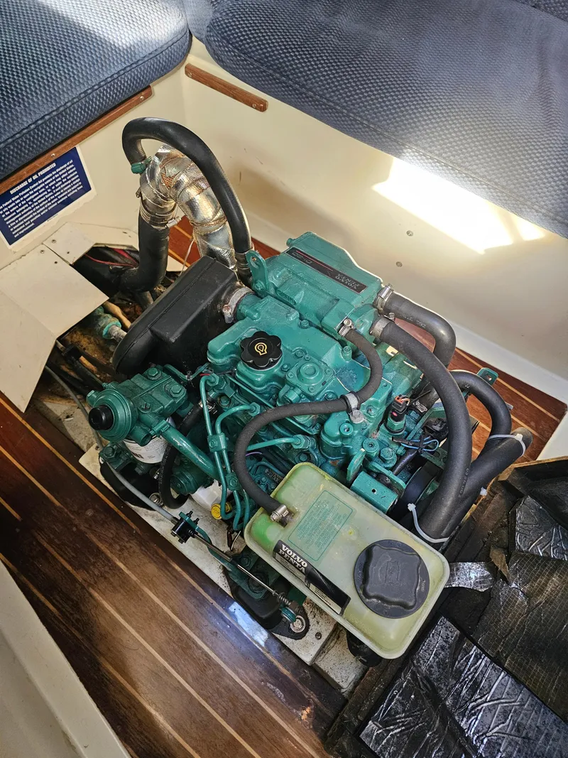 Slide: The Image of Engine of a 1984 Schock NY 36 sailboat, showing detailed components and layout. - 34