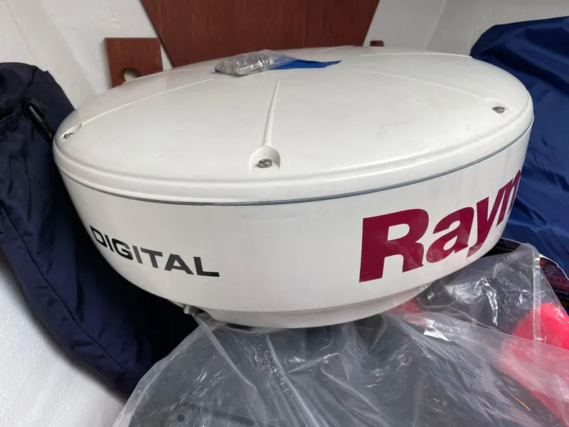 Slide: The Image of Radar equipment on a 1980 Hinterhoeller Niagra sailboat, featuring Raymarine digital technology. - 17