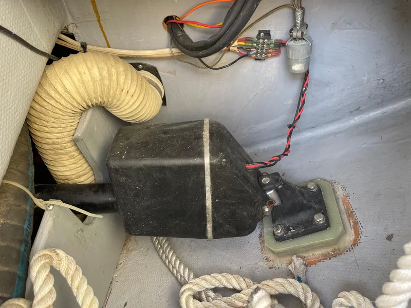 Slide: The Image of 1980 Hinterhoeller Niagra boat interior showing wiring and ventilation components. - 26