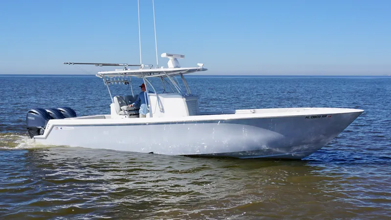 Slide: The Image of 2023 Contender 35 ST boat cruising on open water. - 0