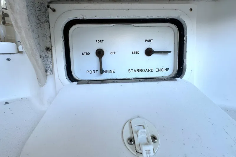 Slide: The Image of 1997 Sea Ray 370 Express Cruiser deck with seating and storage compartments. - 27