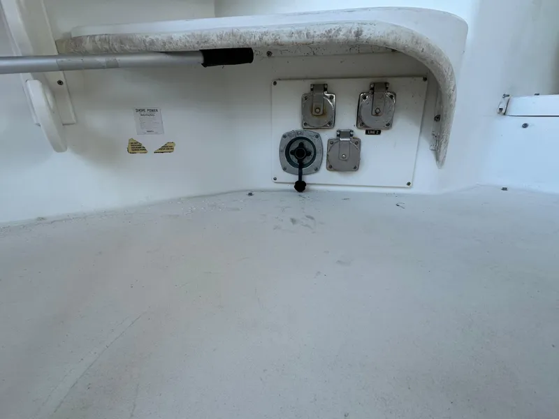 Slide: The Image of 1997 Sea Ray 370 Express Cruiser storage compartments and hatches, interior view. - 29