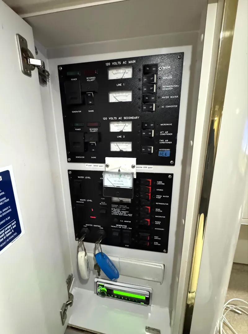 Slide: The Image of Open refrigerator drawer on 1997 Sea Ray 370 Express Cruiser boat, showcasing storage space. - 35