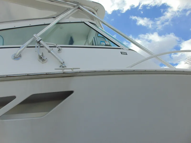 Slide: The Image of 2000 Luhrs T-360SX/SF boat exterior with blue sky background. - 17