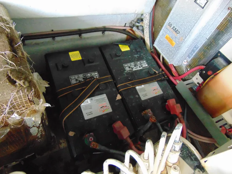 Slide: The Image of Batteries in a 2000 Luhrs T-360SX/SF boat engine compartment. - 24