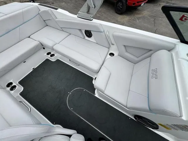 Slide: The Image of 2019 MasterCraft NXT22 dashboard with steering wheel and control panel. - 18