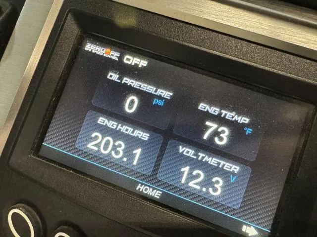 Slide: The Image of Dashboard display of a 2019 MasterCraft NXT22 showing engine metrics. - 26