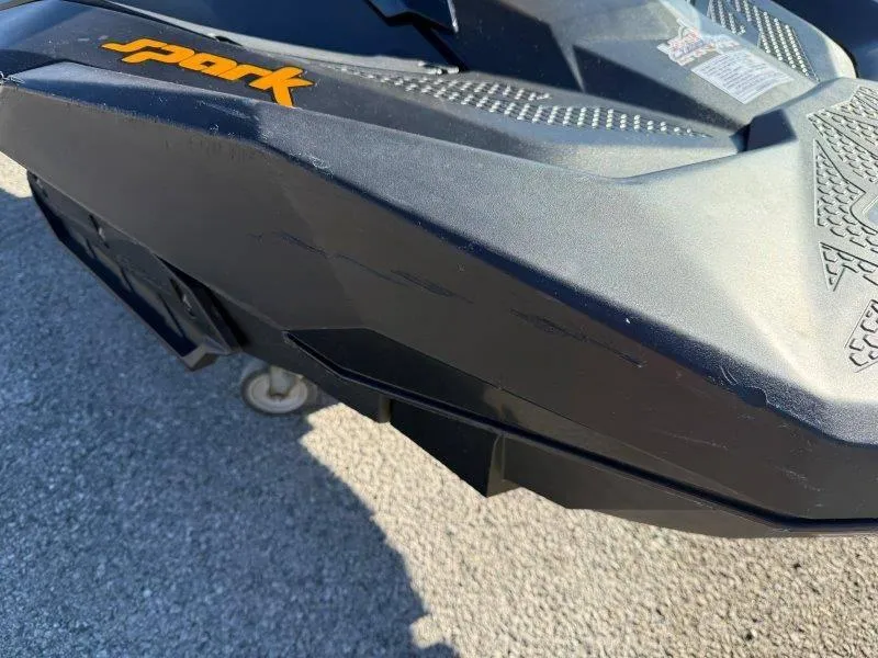 Slide: The Image of 2018 Sea-Doo Spark 3up jet ski, black exterior, close-up view. - 12