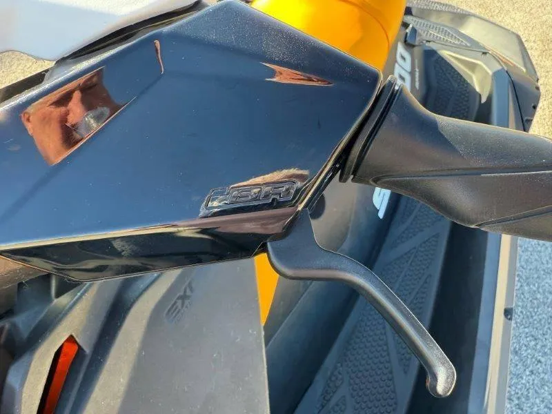 Slide: The Image of Close-up of 2018 Sea-Doo Spark 3up handlebar and brake lever. - 23