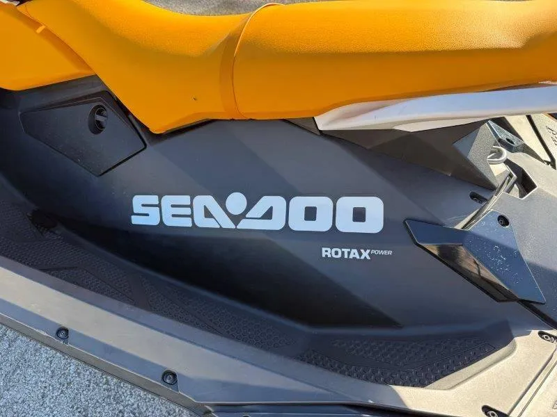 Slide: The Image of 2018 Sea-Doo Spark 3up with Rotax power, featuring a vibrant orange seat. - 33