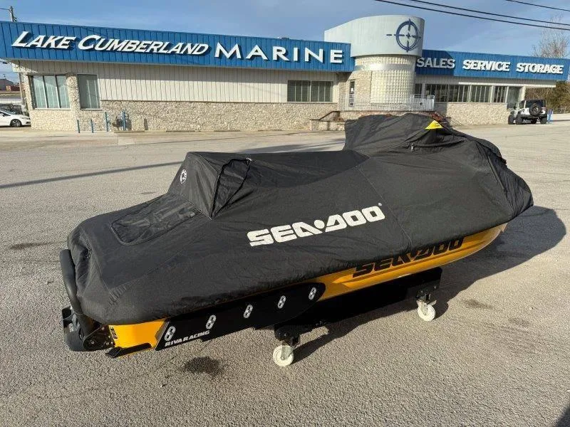 Slide: The Image of 2022 Sea-Doo RXP-X 300 covered, parked at Lake Cumberland Marine. - 16