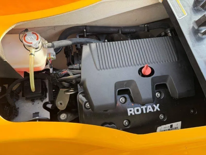 Slide: The Image of 2022 Sea-Doo RXP-X 300 engine compartment with Rotax engine visible. - 27