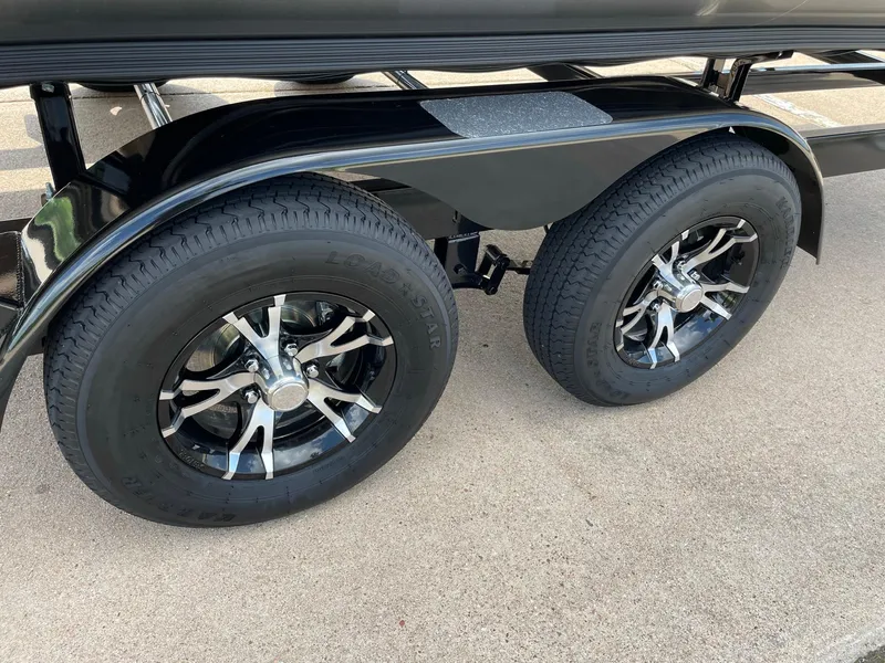 Slide: The Image of 2023 Barletta Lusso 25UCA trailer wheels with sleek black rims. - 20