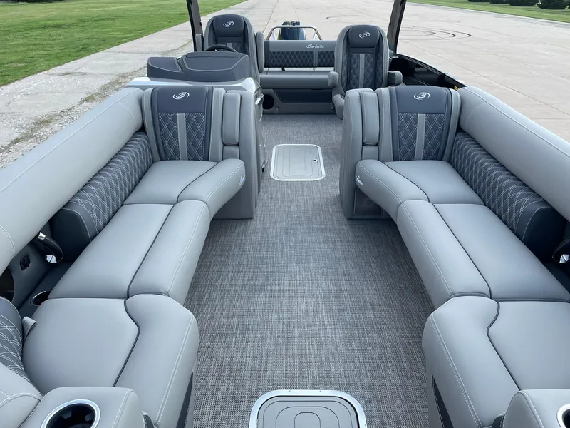 Slide: The Image of 2023 Barletta Lusso 25UCA pontoon boat with luxurious gray seating and spacious interior. - 22