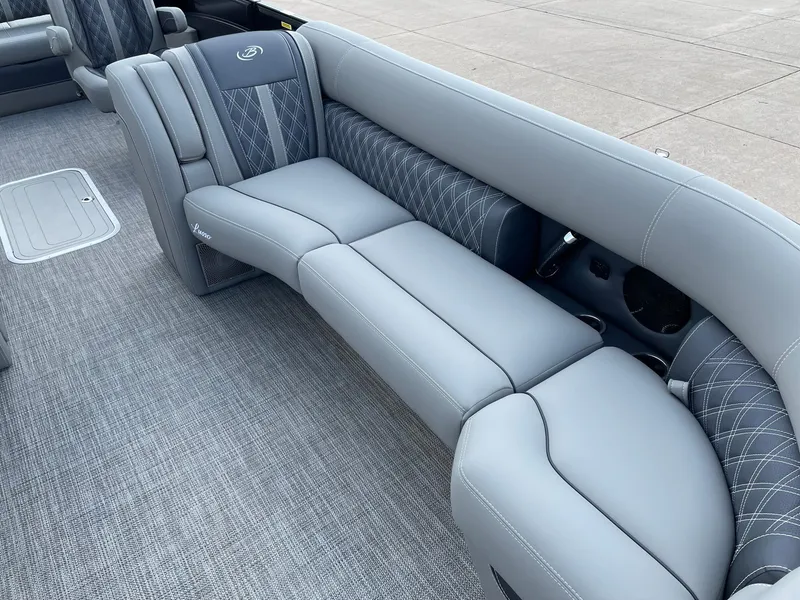Slide: The Image of 2023 Barletta Lusso 25UCA boat interior with luxurious gray seating and elegant design. - 23