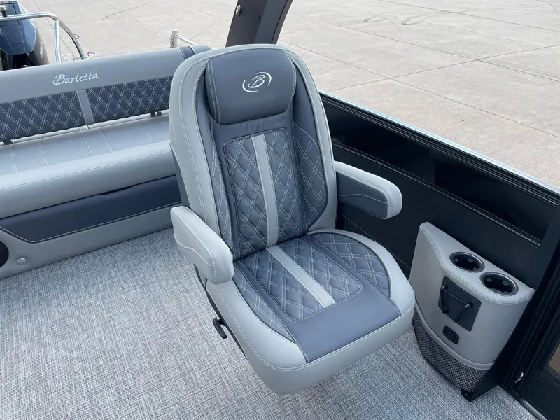 Slide: The Image of 2023 Barletta Lusso 25UCA boat seat with quilted design and cup holders. - 26