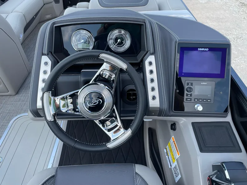Slide: The Image of 2023 Barletta Lusso 25UCA dashboard with steering wheel and digital display. - 31