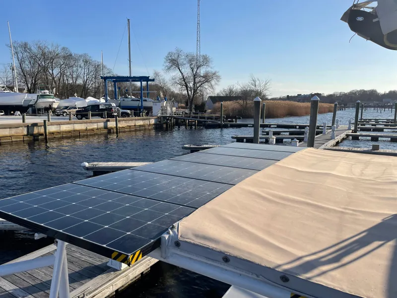 Slide: The Image of Solar panels on a Crowther Custom 46 catamaran docked at a marina, 1991 model. - 20