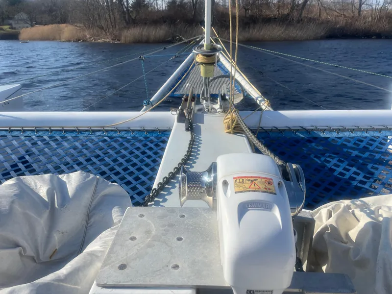 Slide: The Image of Bow view of 1991 Crowther Custom 46 catamaran with winch and netting. - 8