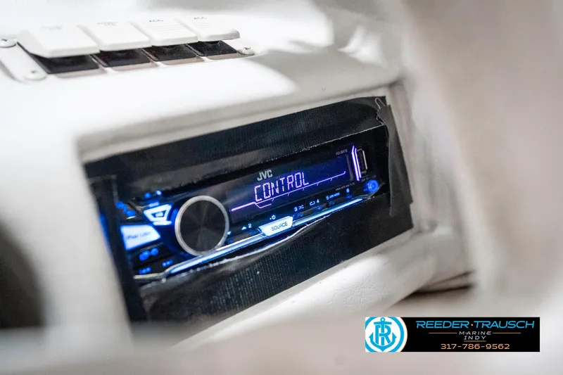 Slide: The Image of JVC stereo system in a 1995 Crownline 182 BR boat dashboard. - 39