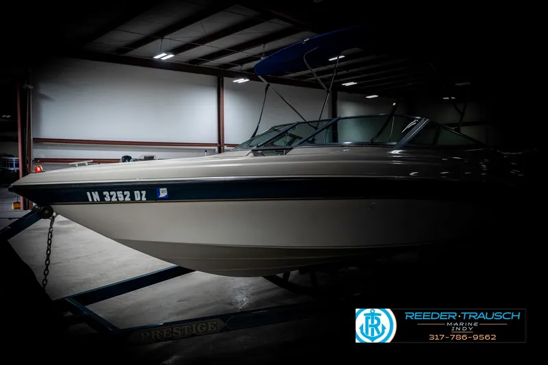 Slide: The Image of 1995 Crownline 182 BR boat in indoor storage, side view. - 4