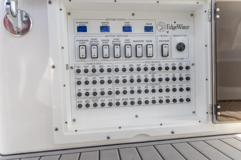 Slide: The Image of Electrical control panel on a 2023 Edgewater 370CC boat. - 22