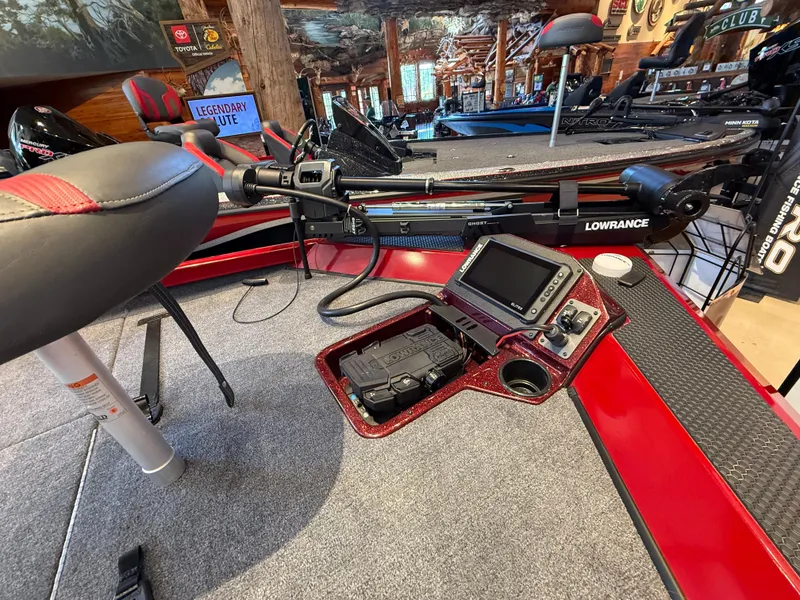 Slide: The Image of 2025 Ranger RT188P boat interior with fishing equipment and Lowrance electronics. - 3