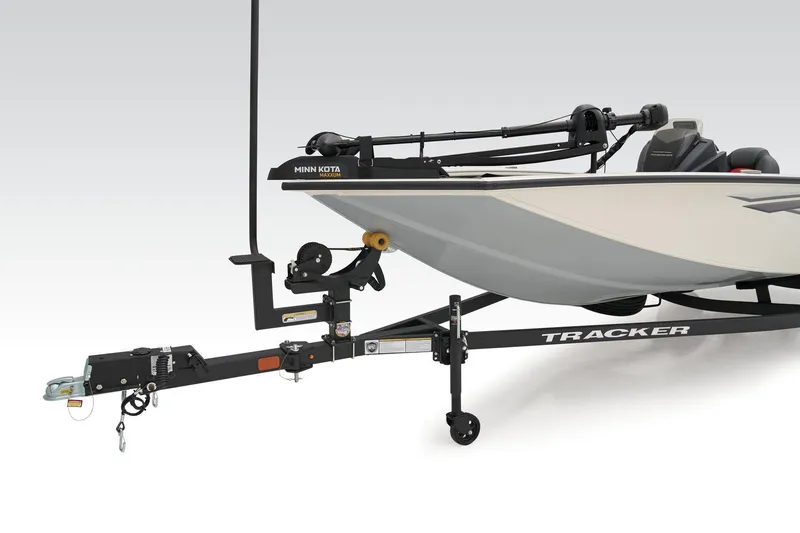 Slide: The Image of 2025 Tracker Pro Team 190 boat with red and black design, featuring comfortable seating. - 8