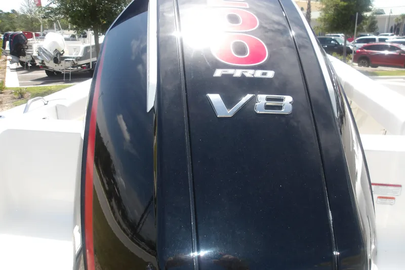 Slide: The Image of Outboard motor on 2025 Mako 214 Center Console boat, featuring V8 Pro engine. - 7