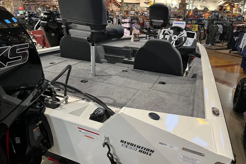 Slide: The Image of 2025 Tracker Pro Team 195 Tournament Edition boat interior at showroom display. - 6