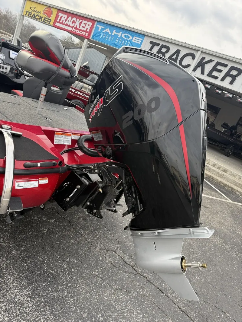 Slide: The Image of 2025 Nitro Z19 boat with powerful 200 HP engine, displayed at Tracker dealership. - 1