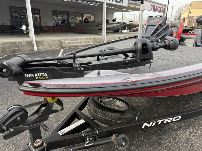 Slide: The Image of 2025 Nitro Z19 boat with Minn Kota Maxxum trolling motor on trailer. - 10