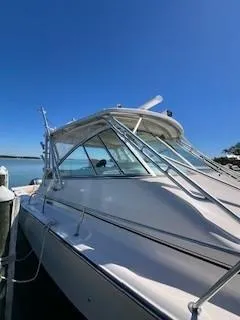 Slide: The Image of 2008 Grady-White Express 360 boat docked under clear blue sky. - 8