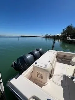 Slide: The Image of 2008 Grady-White Express 360 boat docked by serene waters under clear blue sky. - 9