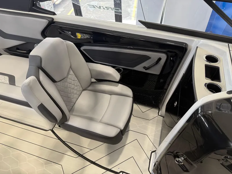 Slide: The Image of 2025 Yamaha Boats 255XD interior with modern seating and sleek design. - 6