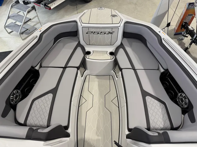 Slide: The Image of 2025 Yamaha Boats 255XD interior with sleek seating and modern design. - 7