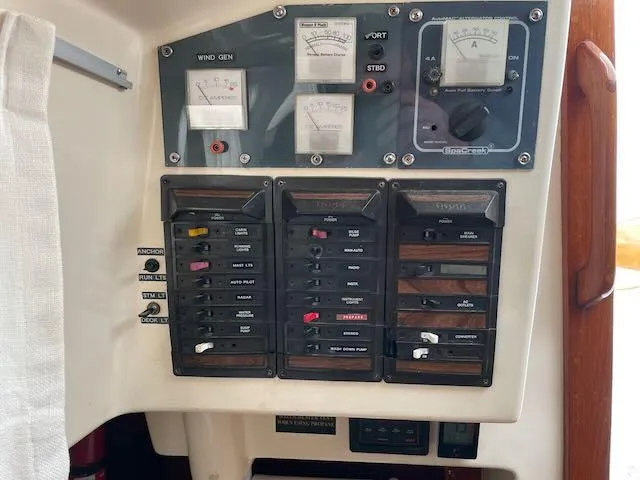 Slide: The Image of Control panel of a 1981 Bristol 40 sloop with gauges and switches. - 11
