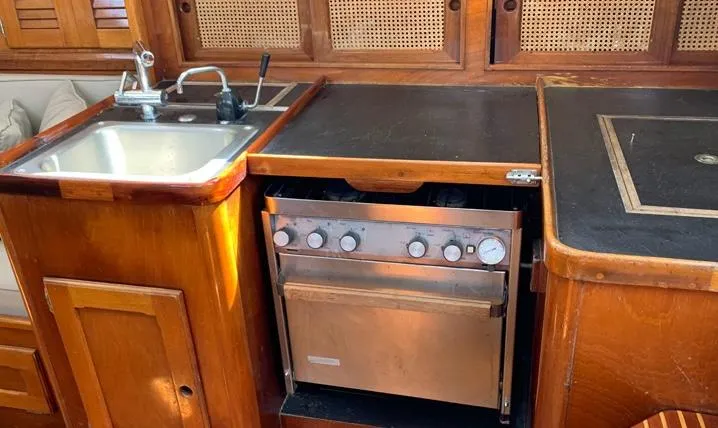 Slide: The Image of Interior of 1981 Bristol 40 sloop showing kitchen sink and stove. - 17
