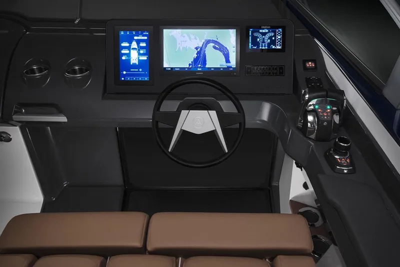 Slide: The Image of 2022 Aviara AV36 OB helm with modern navigation displays and controls. - 17