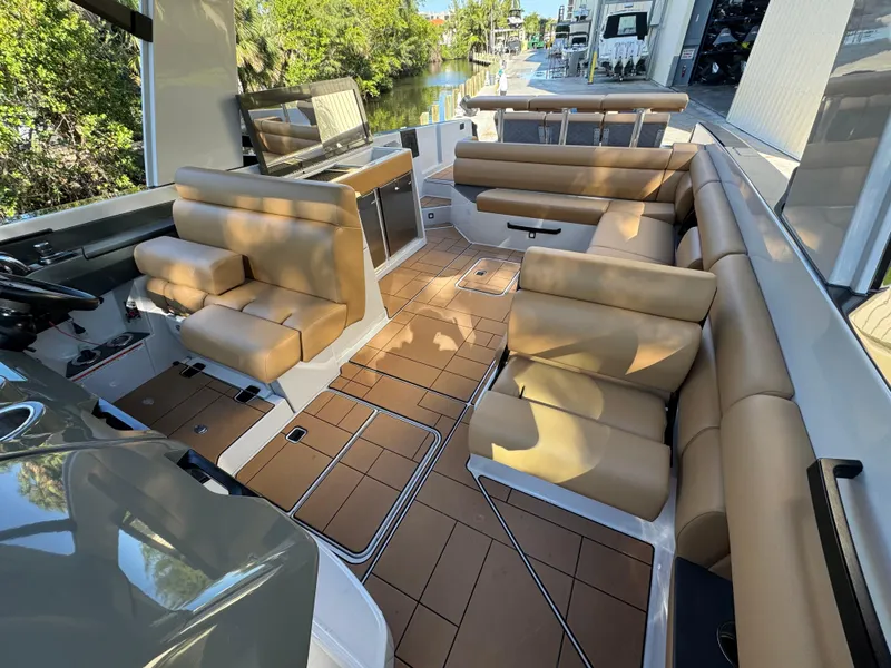 Slide: The Image of 2022 Aviara AV36 OB boat interior with luxurious tan seating and sleek design. - 19