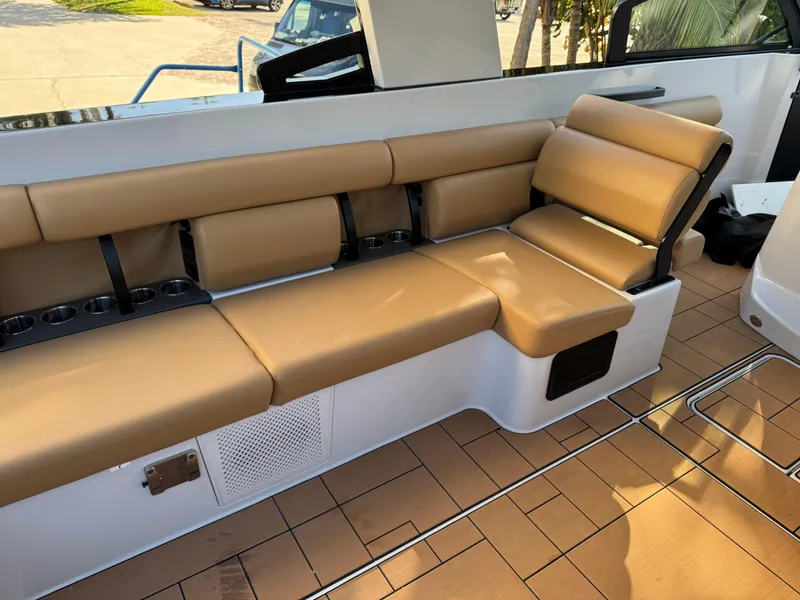 Slide: The Image of 2022 Aviara AV36 OB boat interior with tan leather seating and modern design. - 24